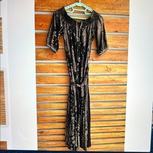 Poupette St Barths Black and gold slit side maxi dress
